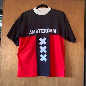 Amsterdam soccer jersey size medium.